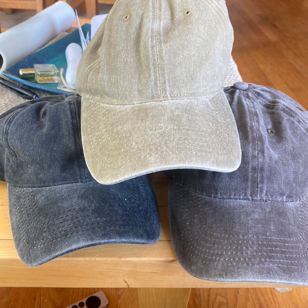 3 hats one blue, one khaki, one grey. Never worn.